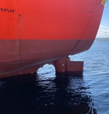 Red ship with rudder